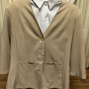 Size 14 2 piece tan skirt suit. Never worn, with the original tags.